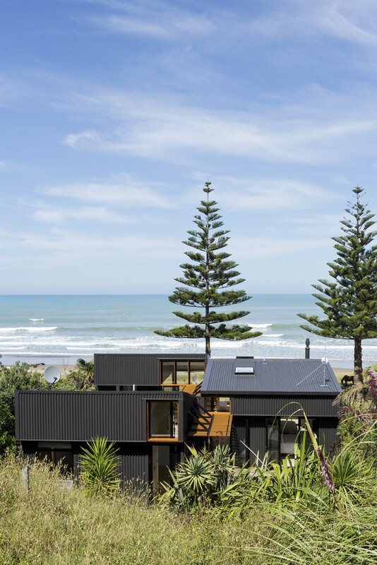 offSET Shed House is a beach house with a large opening to the sea (14)