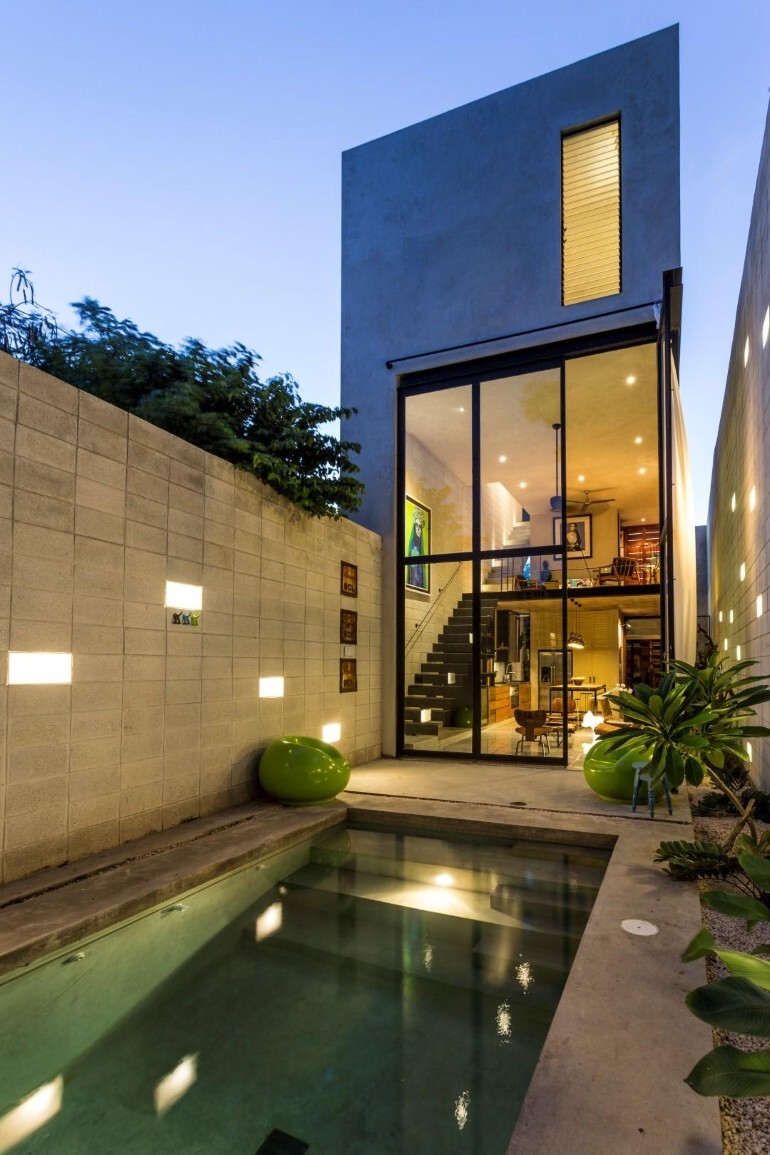Raw House - Maximizing Vertical Space and Light on a Narrow Lot