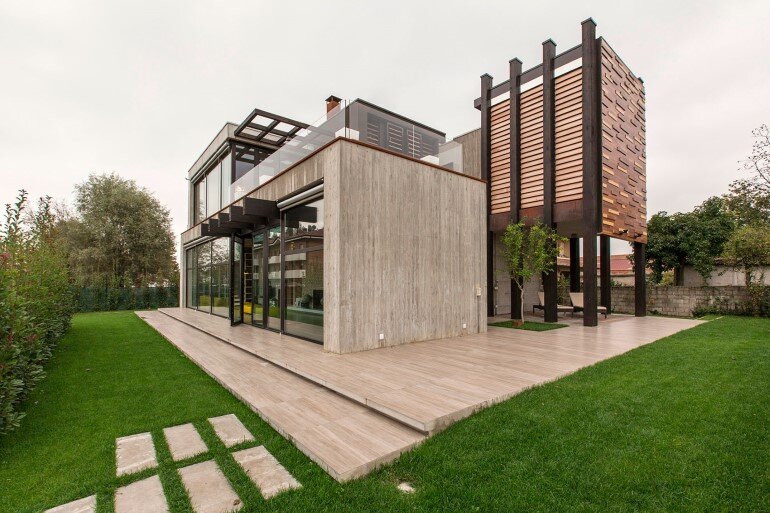 Modern Concrete Block House With Wooden Patio Attached