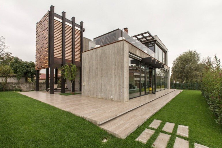 Modern Concrete Block House with Wooden Patio Attached