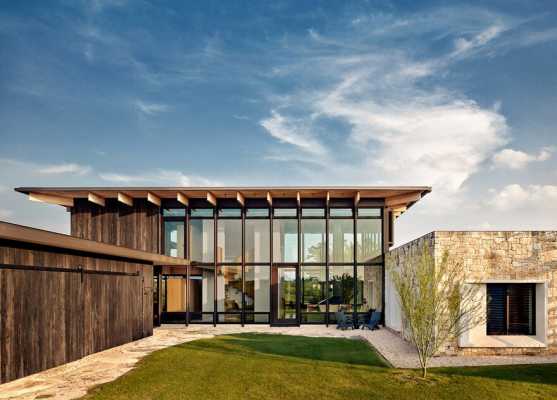 Contemporary Texas Retreat with Double-Height Glass Walls that Encase the Living Areas