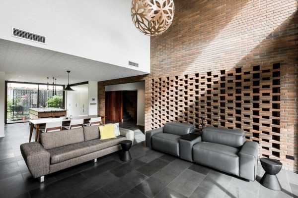 Impressive Brick Home with Open and Glazed Living Spaces