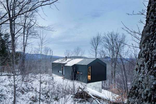 Quebec Country House Consisting of Two Stacked Volumes