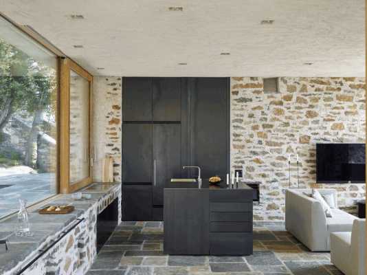 Stunning Stone House in Switzerland Unveils Modern Interiors