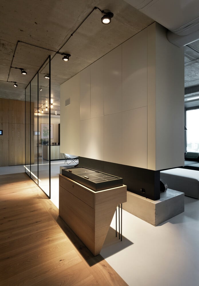 Penthouse with Concrete Ceiling and a Glass-Wall Windows