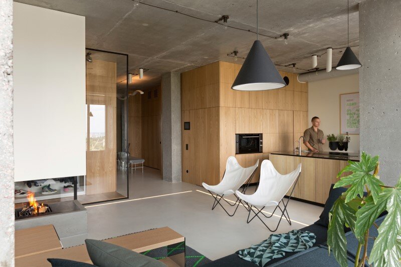 Penthouse with Concrete Ceiling and a Glass-Wall Windows