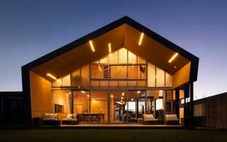 Rusted Steel Cladding House with Crafted Interior Finishes