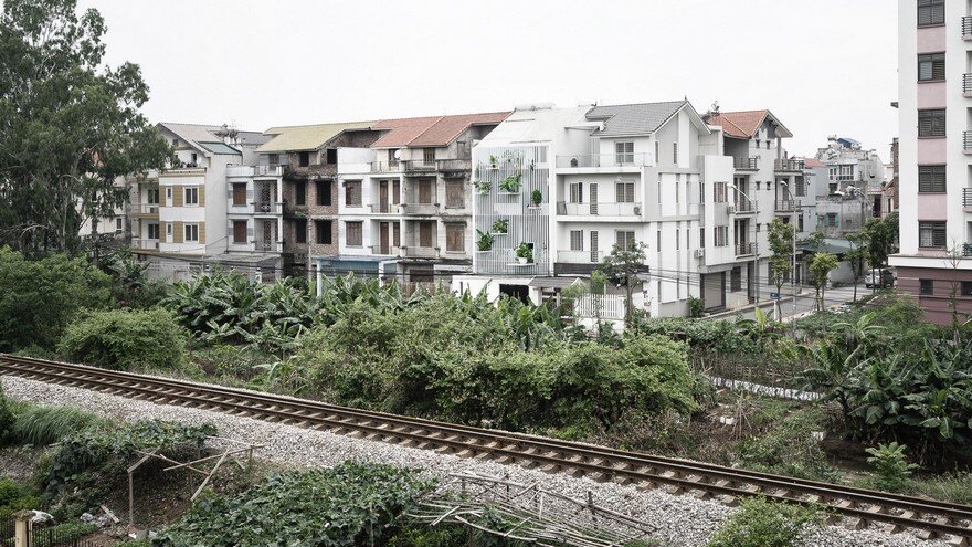 DANstudio Renovates House in Hanoi with Green Balconies Facade 1
