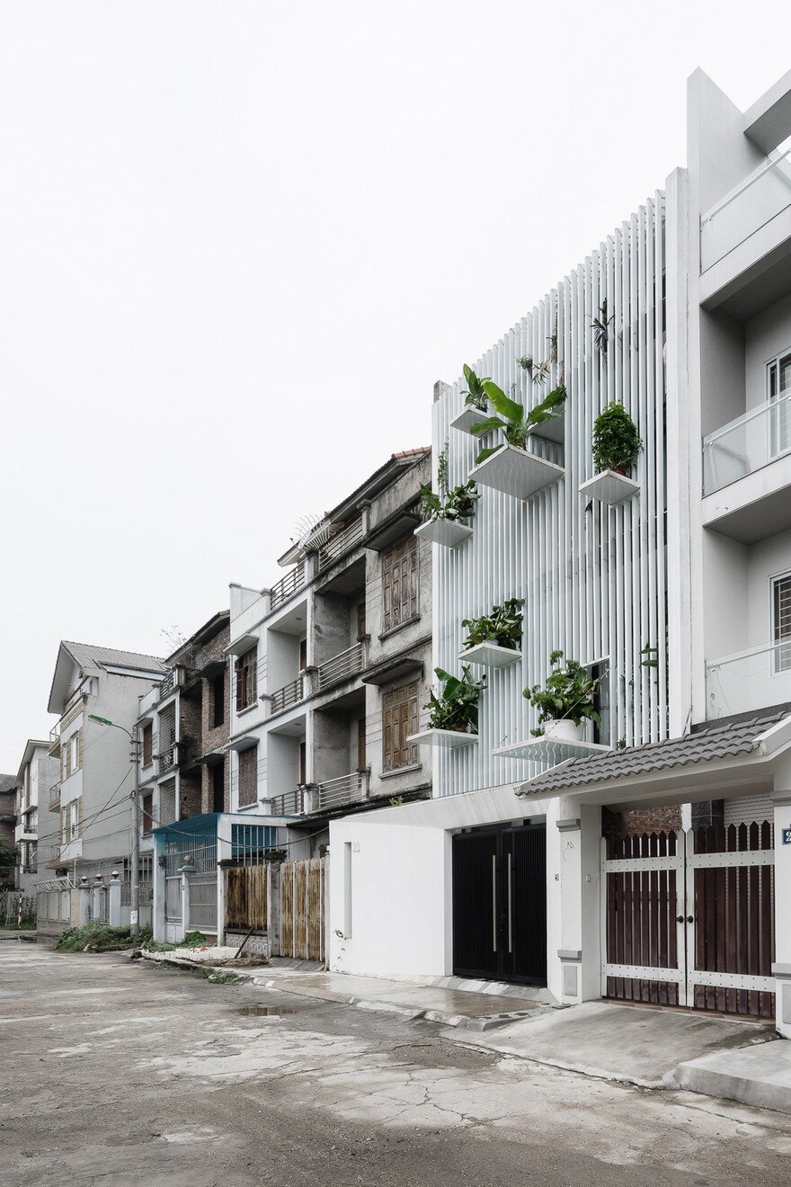 DANstudio Renovates House in Hanoi with Green Balconies Facade 2