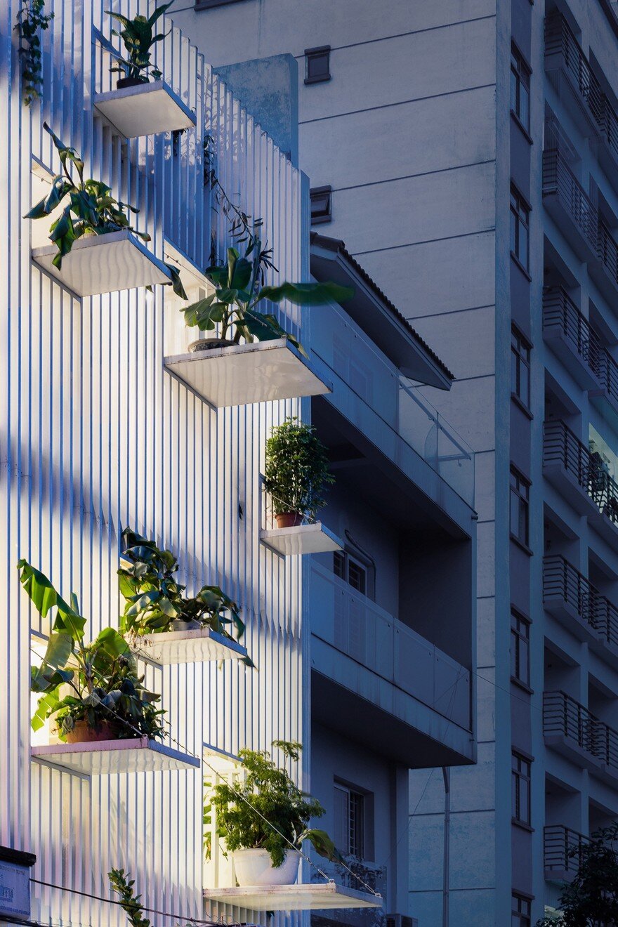 DANstudio Renovates House in Hanoi with Green Balconies Facade 13