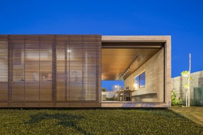 One Level Concrete House Providing Spaces for Leisure and Socializing 1