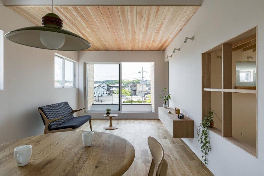 Box Shaped Japanese Home with Warm Minimalist Interior Design 