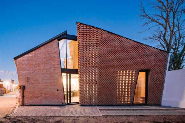 Red Brick House in Mexico with Bricks Arranged in an Artisanal Way