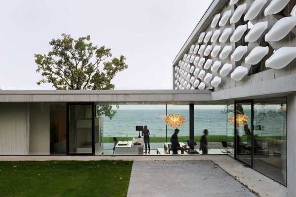 Contemporary Lake House Made Entirely of Raw Concrete