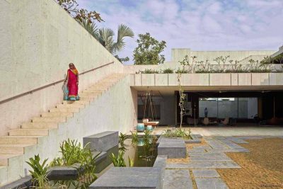 Cruciform Shaped House with Living Spaces Immersed in Secret Garden Courtyards 3