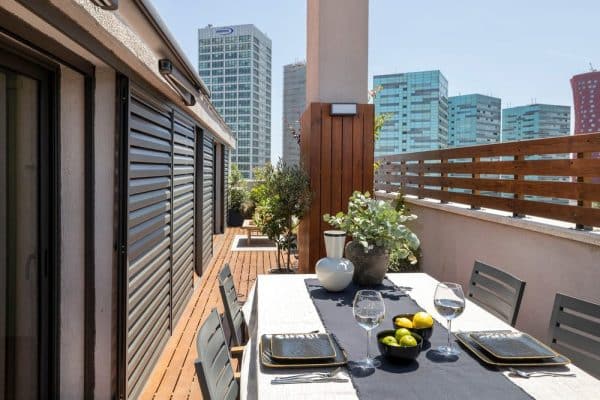 Small Penthouse with Two Terraces: Barcelona’s Urban Oasis by Brákara Studio